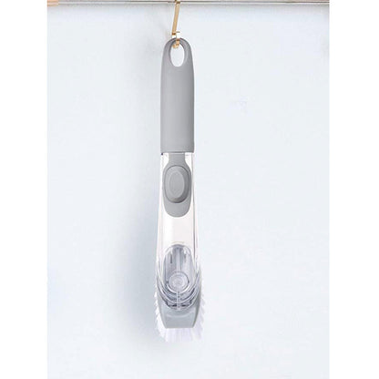 Liquid dispensing dish brush